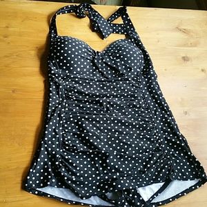 Polka-dot women's swim suit.